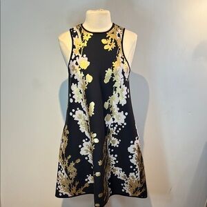 Cynthia Rowley Black swing  Dress with Gold floral Accents size 10